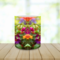 Gift idea for bird lovers and gardeners. Close-up of a hummingbird and flowers on a mug made by Tammi Oribello Designs.